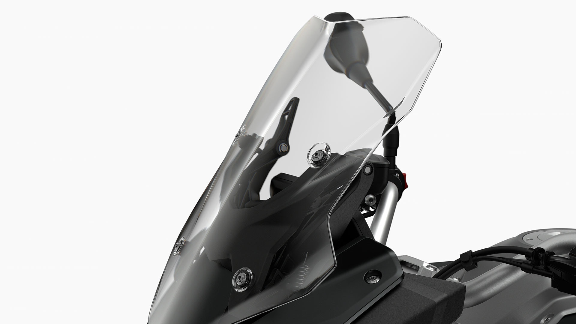 We see the windshield of the BMW F 900 XR.
