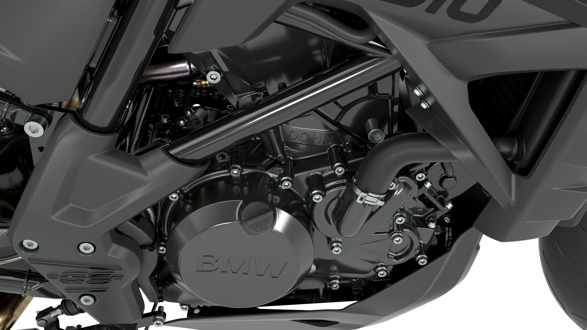 Vemos o bloco do motor, integralmente em preto, com a inscrição G 310.